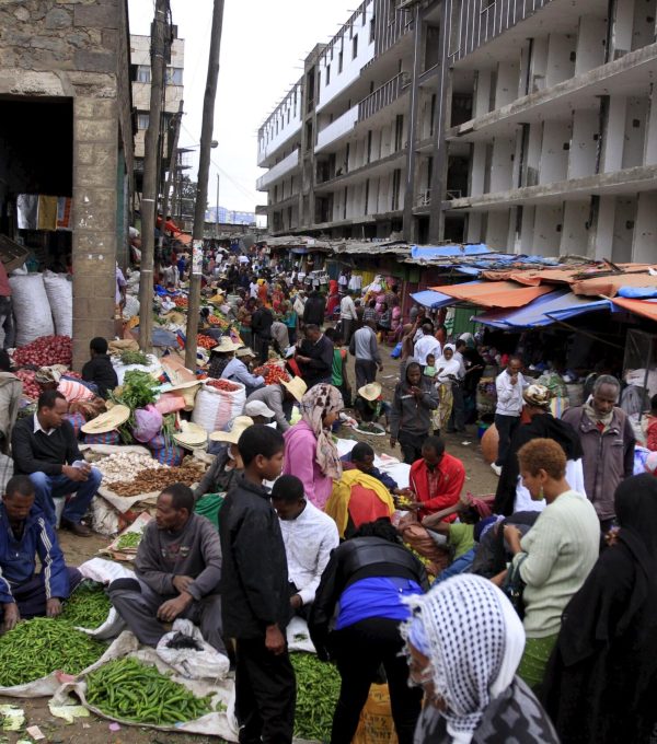 People buy vegetables at a busy market in Mercato, Addis Ababa December 15, 2015. (Photo by Tiksa Negeri/Reuters)